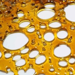 Buy Raspberry Cough Shatter UK online. ICE x Cambodian Landrace hybrid shatter with sweet berry flavor and a smooth, potent high for medicinal and recreational users. Discreet UK delivery